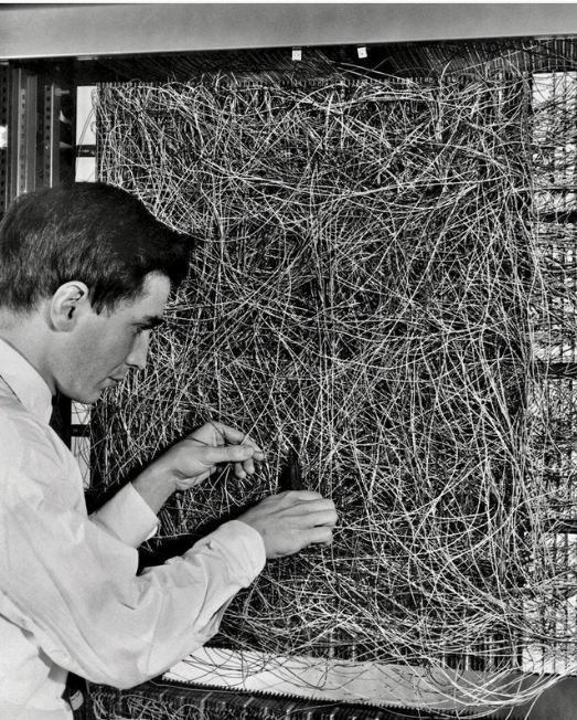 Frank Rosenblatt with a Mark I Perceptron computer in 1960, one of the first artificial neural networks.